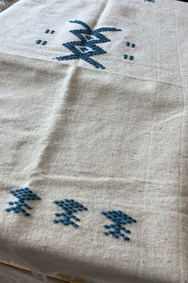 petit plaid motifs amazighs bleu clair